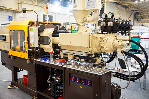 AdobeStock_426764318 An industrial plastic injection machine.